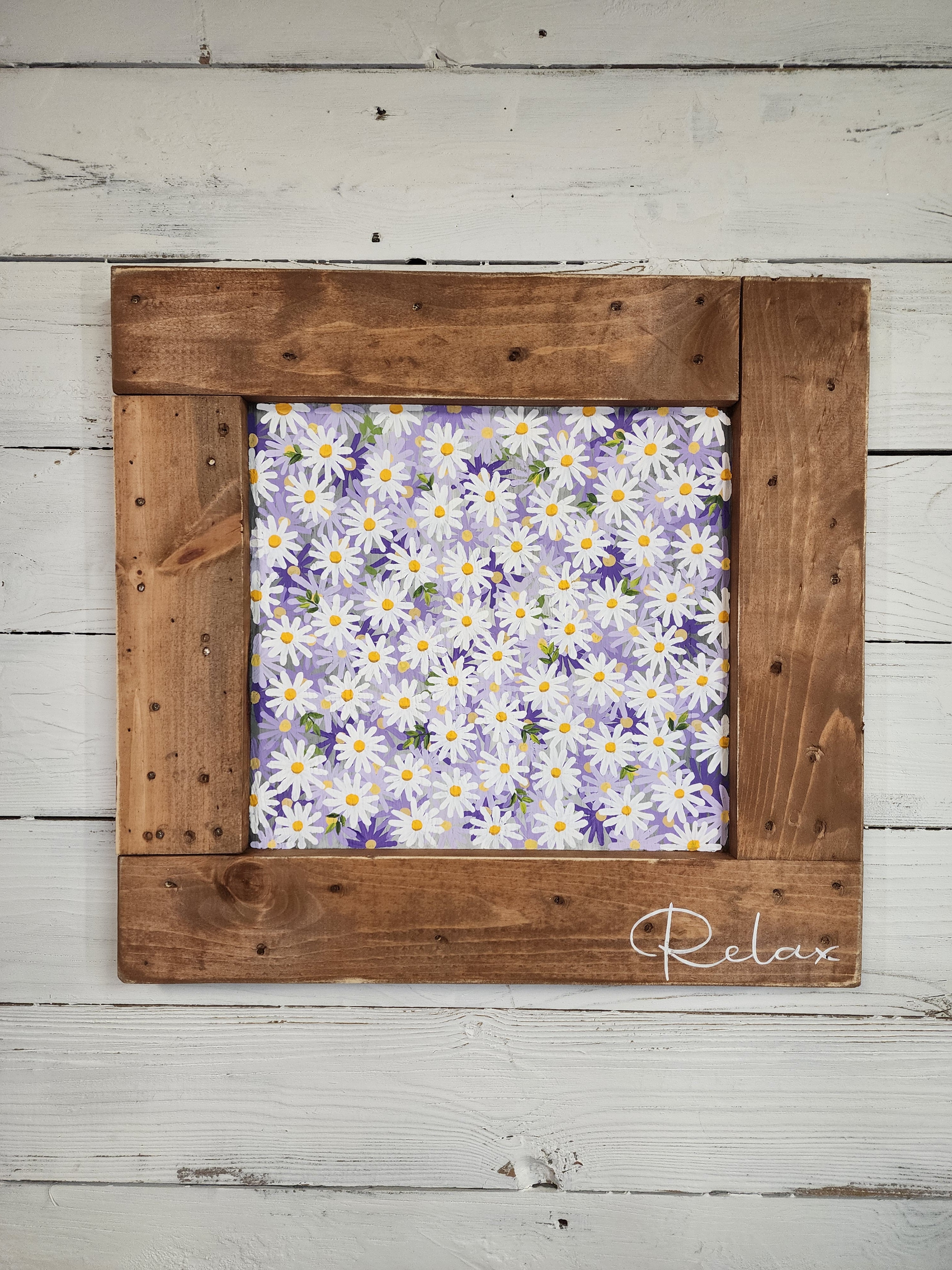 Natural pallet wood frame with solid hand painted  daisies all over the pallet in 4 shades of purple