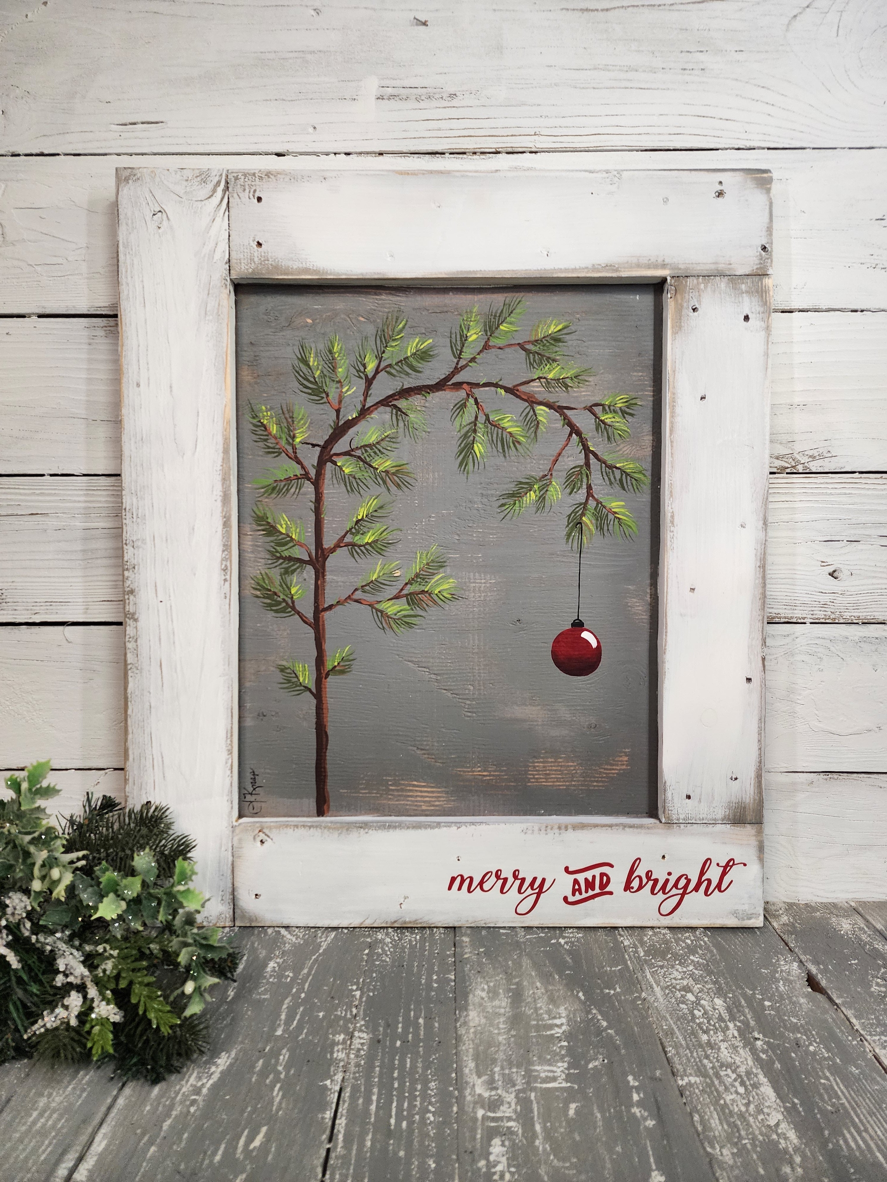 Hand painted Charlie B Christmas tree on recycled pallet wood, Red "Merry and Bright" word sign, classic red Christmas bulb, white frame