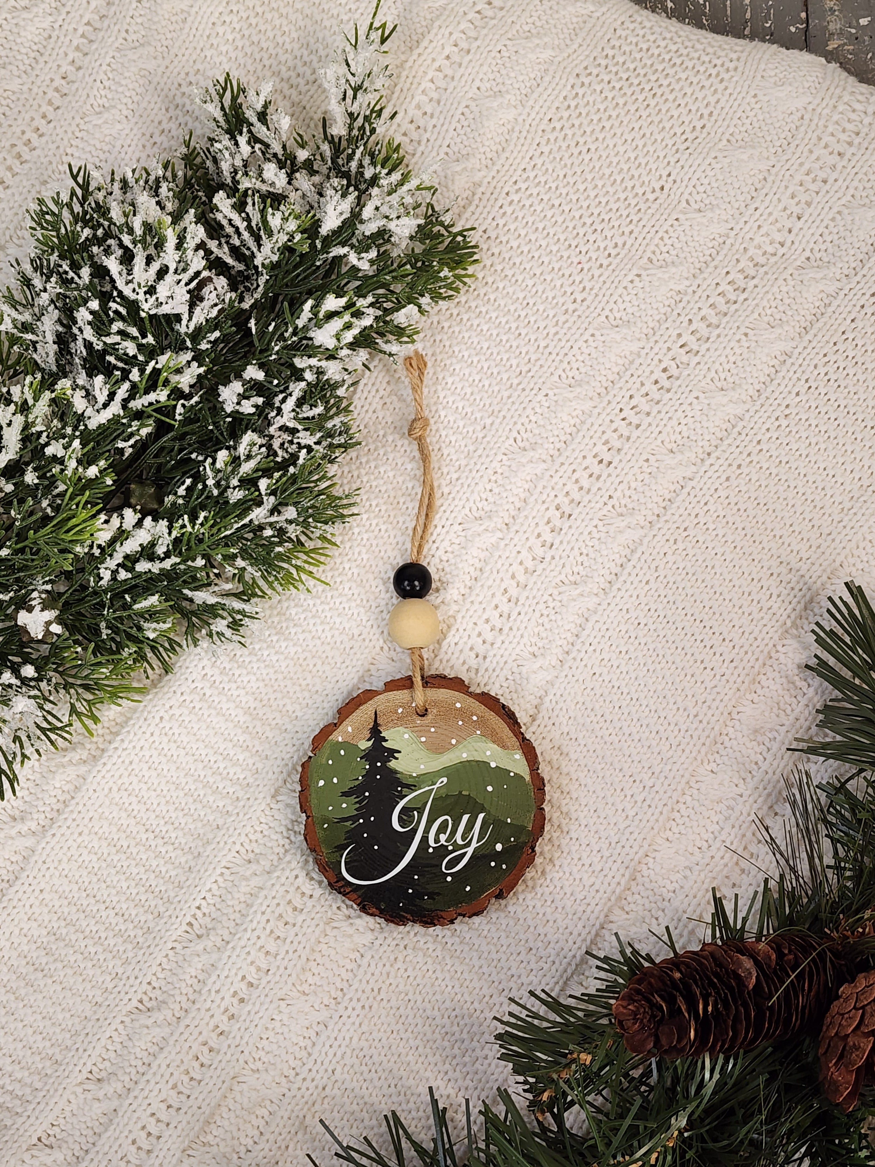Hand-Painted Mountain Wood Slice Ornament • Rustic green mountains with JOY • Snowy Pine - Nature Christmas Decor • Handmade Holiday Gift