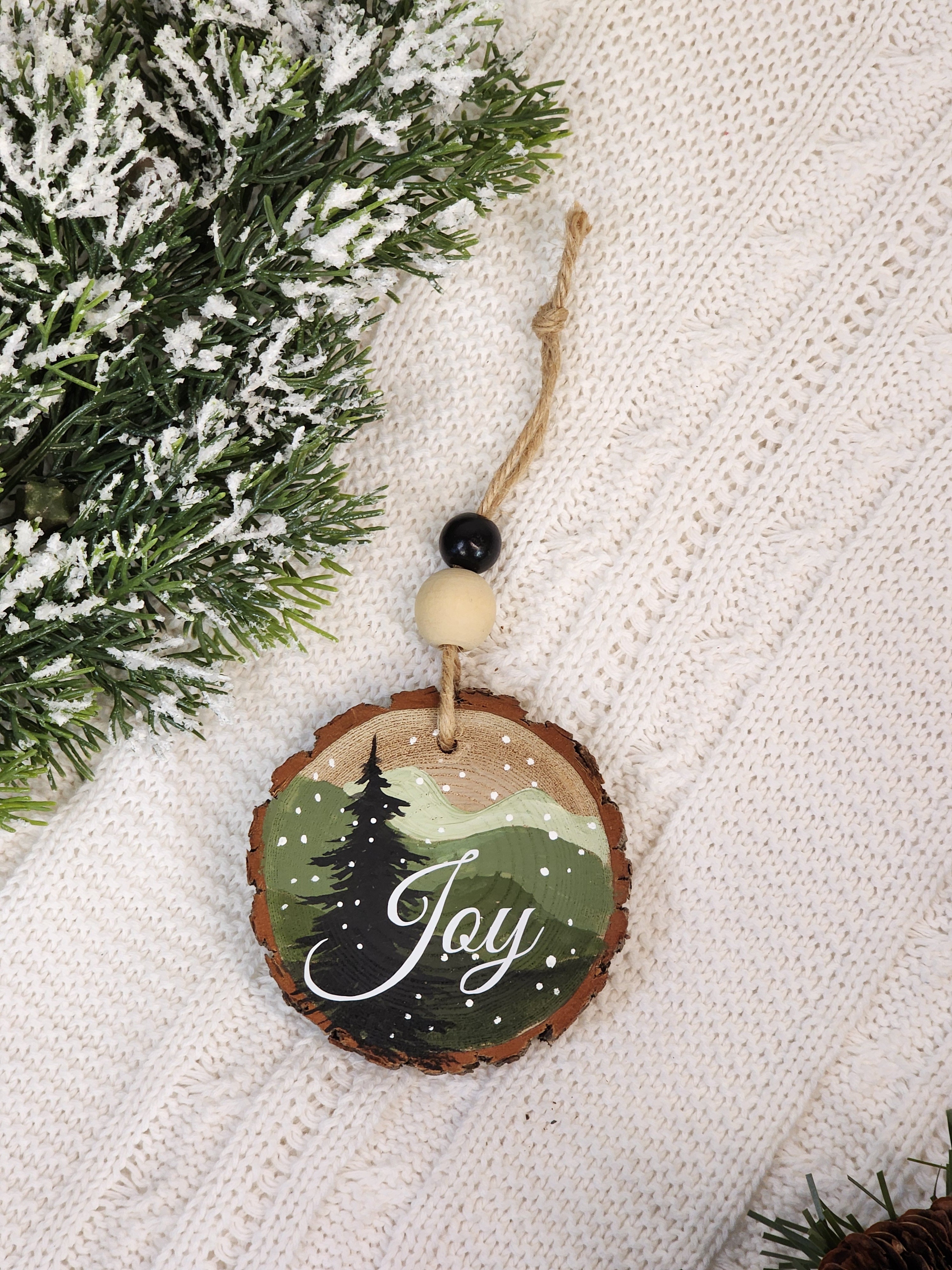 Hand-Painted Mountain Wood Slice Ornament • Rustic green mountains with JOY • Snowy Pine - Nature Christmas Decor • Handmade Holiday Gift