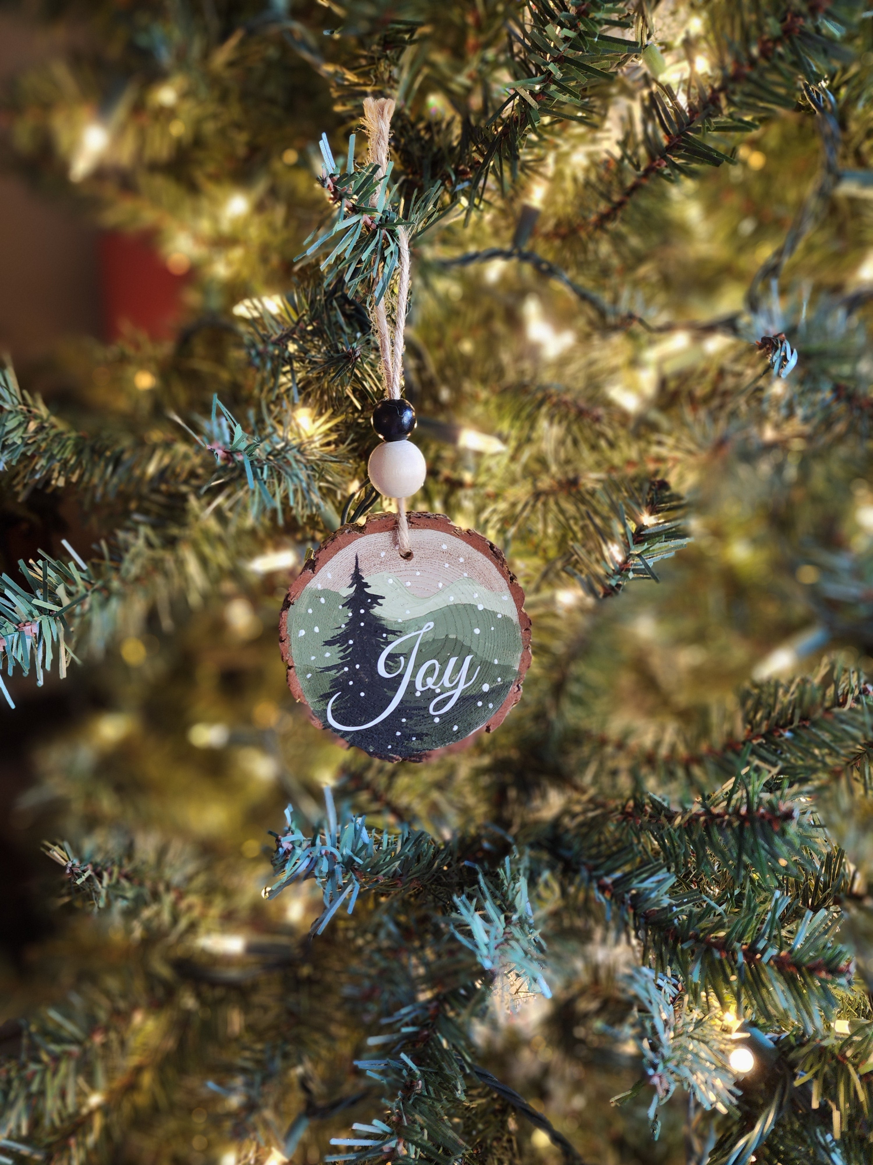 Hand-Painted Mountain Wood Slice Ornament • Rustic green mountains with JOY • Snowy Pine - Nature Christmas Decor • Handmade Holiday Gift