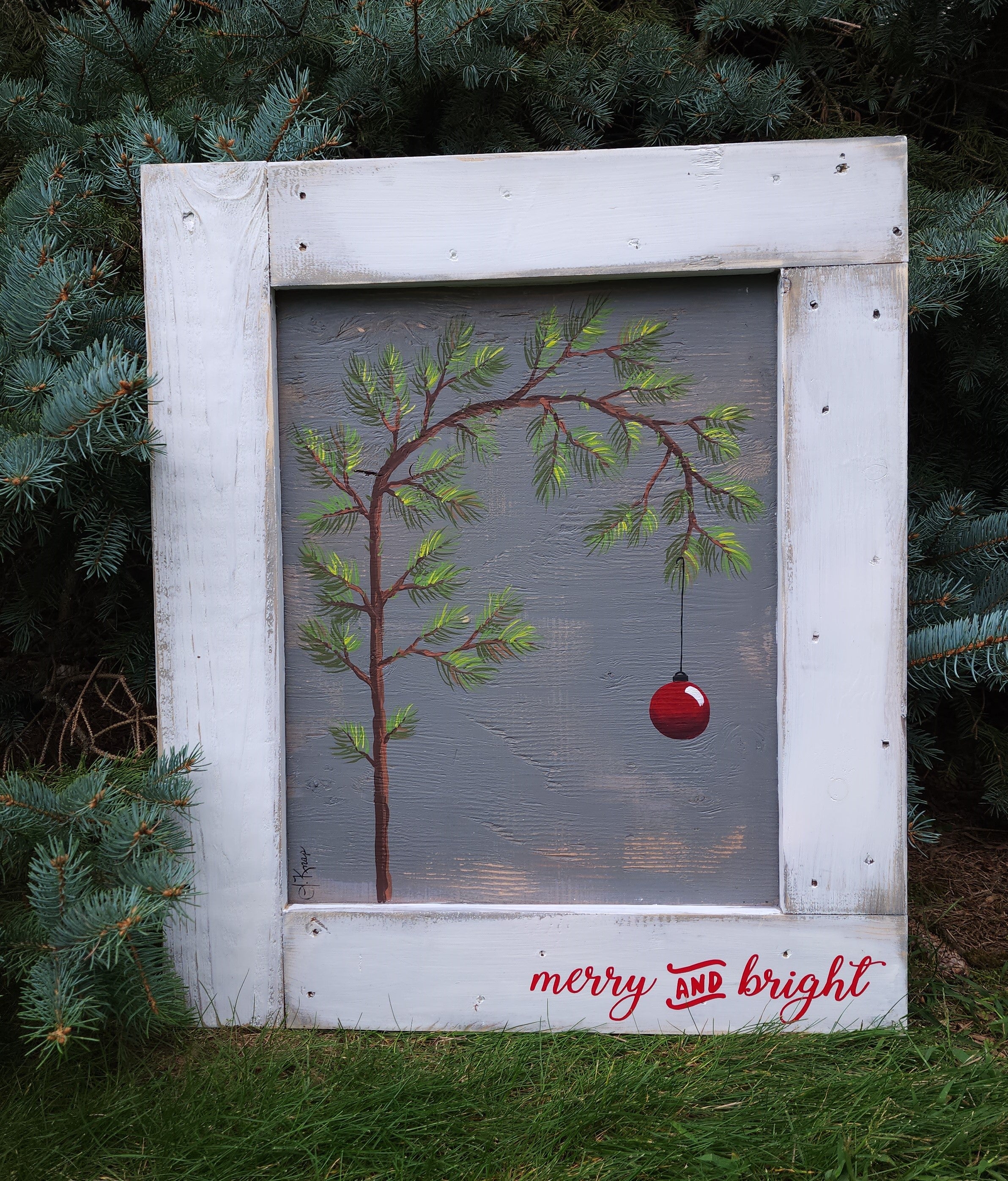 Hand painted Charlie B Christmas tree on recycled pallet wood, Red "Merry and Bright" word sign, classic red Christmas bulb, white frame