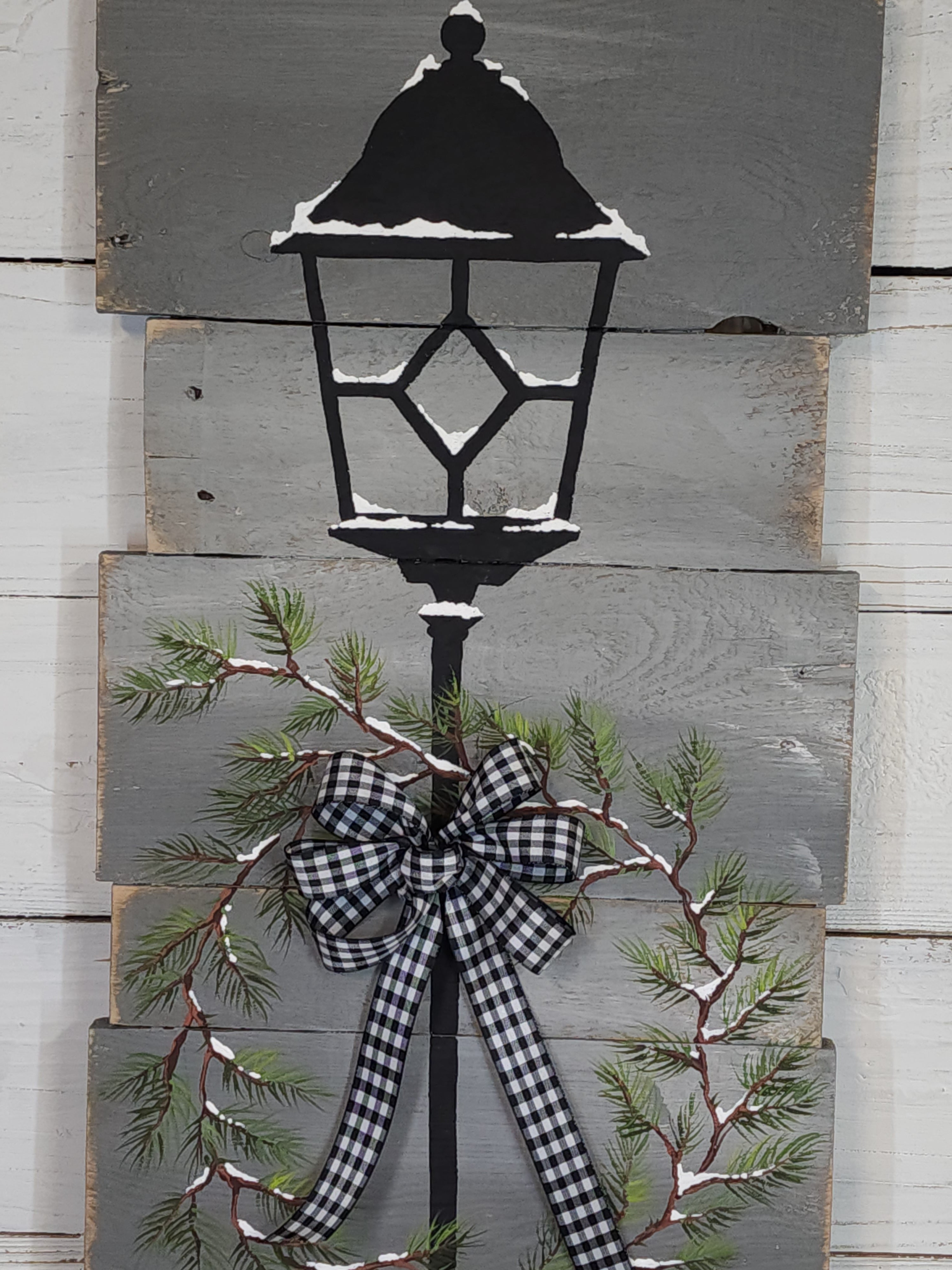 Merry Christmas pallet wood welcome sign, Hand painted pine branch wreath on lantern, buffalo plaid bow, black light pole